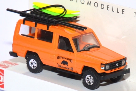 Toyota Land Cruiser HZJ 78 Jeep Discovery mit 2 Surfbrettern orange 43502