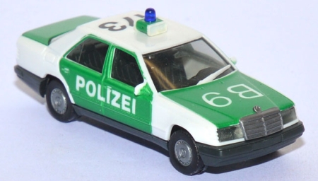 Mercedes-​Benz 300 E Polizei grün