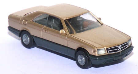 Mercedes-​​​​​​​Benz 560 SEC goldmetallic