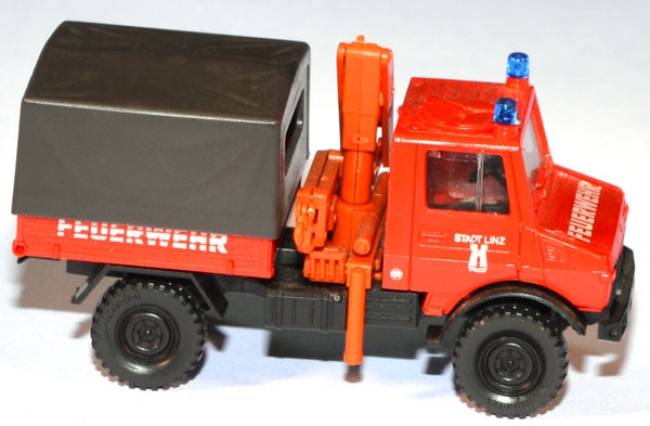 Mercedes-Benz Unimog U 1300 L Pritsche mit Ladekran Feuerwehr rot