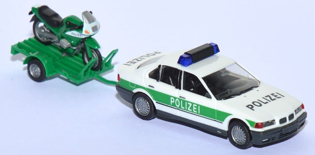 BMW 325i mit Anhänger und Motorrad BMW RS 1100 Polizei