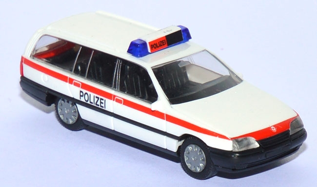 Opel Omega A GLS Caravan Polizei Schweiz weiß