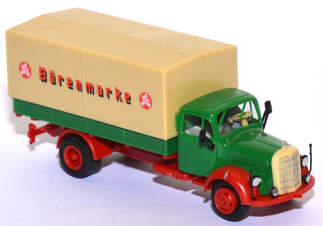 Mercedes-​Benz L 311 Pritschen-​LKW Bärenmarke grün