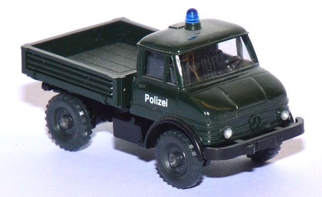 Mercedes-​Benz Unimog U 406 Pritsche Polizei Bayern tannengrün