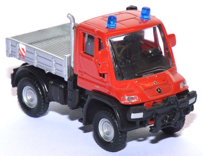 Mercedes-​Benz Unimog U 300 Pritsche Feuerwehr rot