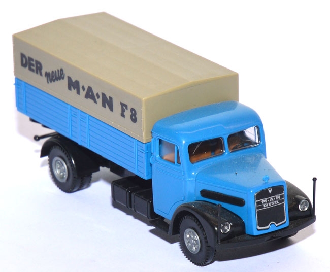 MAN F8 Pritschen-​​LKW mit Plane blau