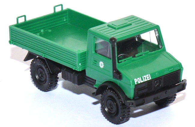 Mercedes-Benz Unimog U 1300 L Pritsche Polizei grün
