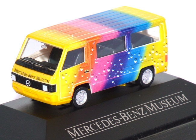 Mercedes-​Benz 100 D Bus - Der Tropfen / Regenbogen